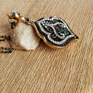 Black and Gold Pendant Necklace